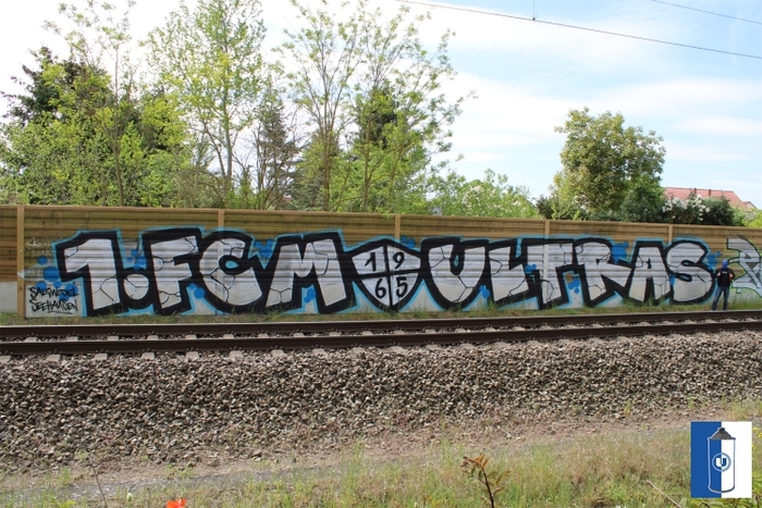 Graffitis machen grauen Wände lebendig